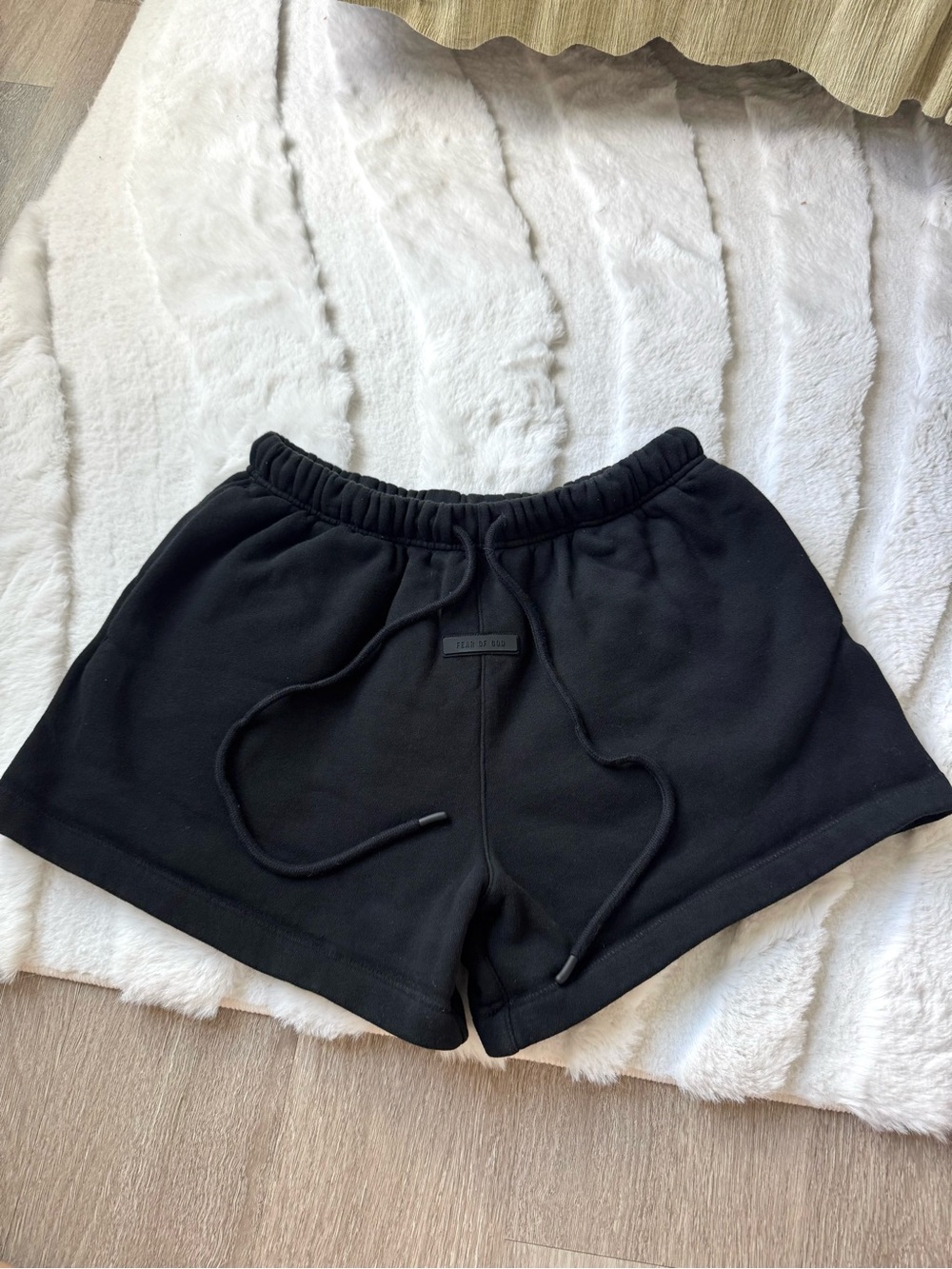 Fear of God Essentials Signature Classic Running Fleece Shorts in Jet Black